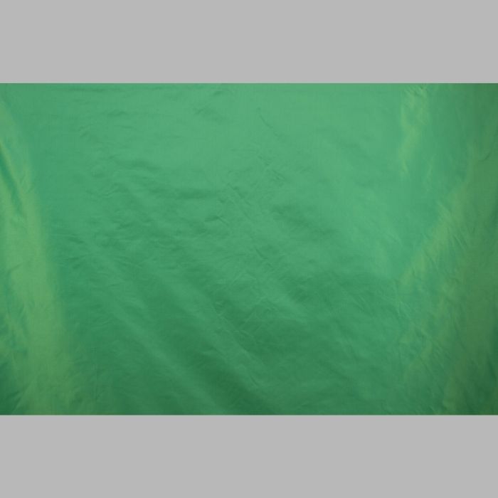Tissu synthétique vert clair brillant largeur 140 cm